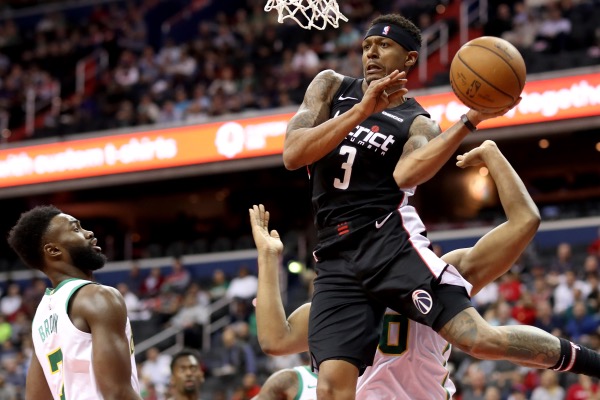 Bradley Beal #3 of the Washington Wizards passes the ball against the Boston Celtics in the first half at Capital One Arena in Washington, D.C., on April 9, 2019. (Rob Carr/Getty Images)