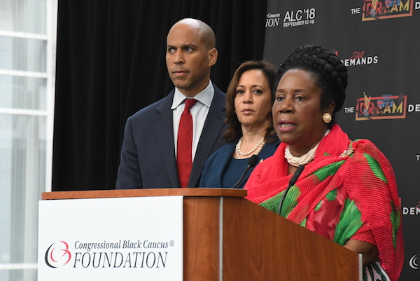 Rep. Sheila Jackson Lee speaks during the opening day of the Congressional Black Caucus Foundation's 2018 Annual Legislative Conference in D.C. on Sept. 12, as Sens. Cory Booker (left) and Kamala Harris look on. (Roy Lewis/The Washington Informer)