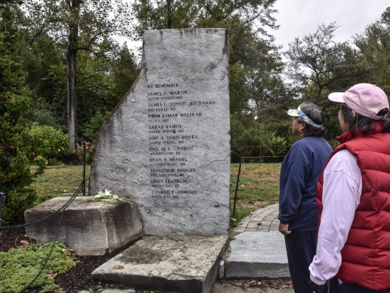 Patrons of Brookside Gardens in Wheaton, Maryland, continue to visit a reflection terrace that honors the victims of John Allen Muhammad and Lee Boyd Malvo. (Robert R. Roberts/The Washington Informer