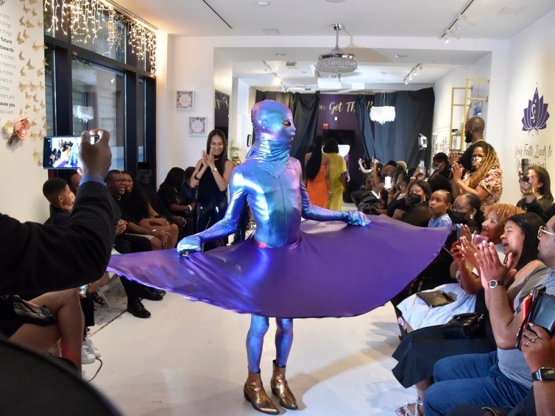 An outfit designed by Consuela Wintz portraying “social distance” is featured at a fashion show June 12 at Café Crystal by Faith2Felicity at National Harbor. (Robert R. Roberts/The Washington Informer)