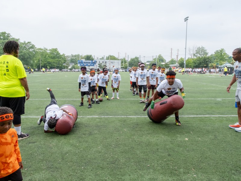 The Military Bowl Foundation and Positive Choices Inc., teamed up to host the 18th annual Youth Football Clinic at Deanwood Recreation Center in D.C. on July 2. (Ja'Mon Jackson/The Washington Informer)