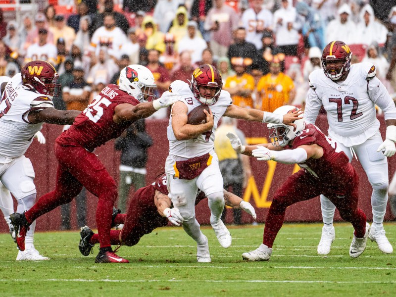 Washington Commanders quarterback Sam Howell (14) led the team to a season-opening 20-16 win over the Arizona Cardinals at FedEx Field in Landover, Maryland, on Sept. 10. (Abdullah Konte/The Washington Informer)