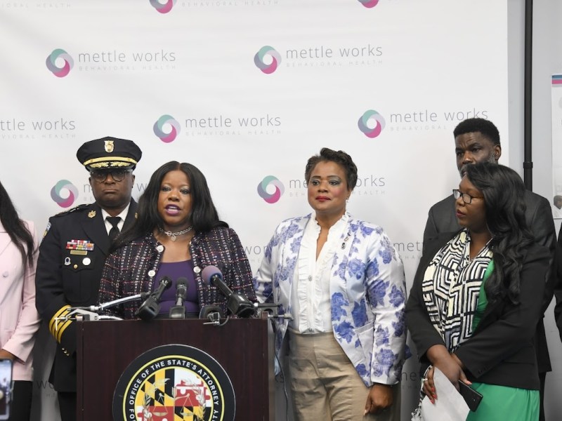 Prince George’s County State's Attorney Aisha Braveboy (at podium) joined Sheriff John Carr, several mayors, and others on Oct. 3 to unveil a plan to drastically reduce the number of family violence cases. (Anthony Tilghman/The Washington Informer)