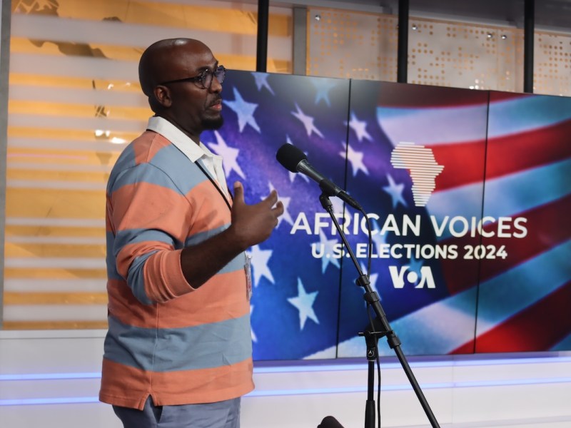 An audience member asks a question at the African Voices U.S. Elections 2024 town hall at the Voice of America headquarters in Washington, D.C., on Oct. 5. (Eden Harris/The Washington Informer)