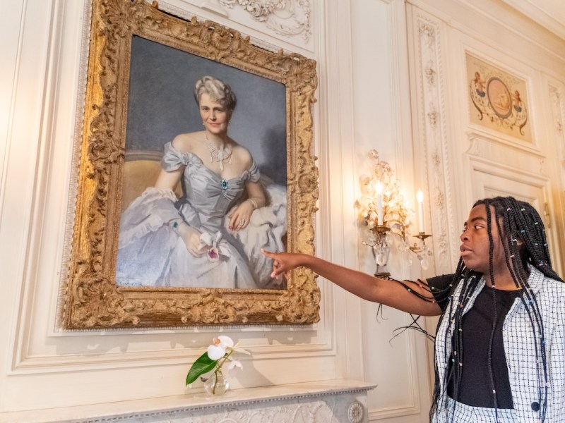 At Hillwood Estate, Museum and Garden in Northwest D.C., intern Taylor Banks gives a short presentation. (Ja’Mon Jackson/The Washington Informer)