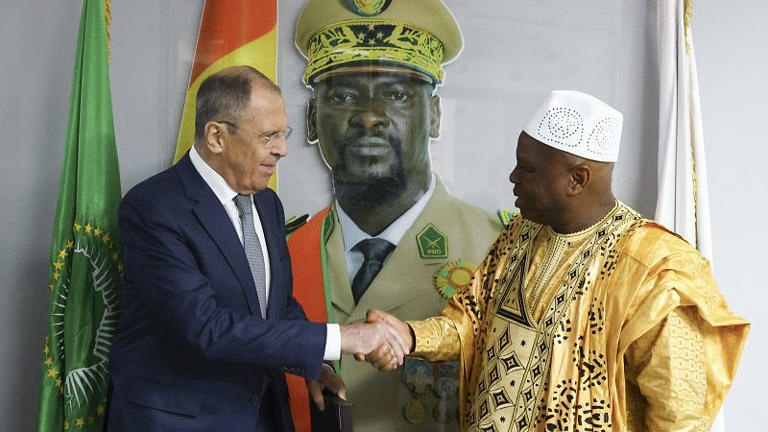 Russian Foreign Minister Sergey Lavrov and Guinea’s Foreign Minister Morissanda Kouyate shake hands. (Courtesy of Russian Foreign Ministry Press Service)