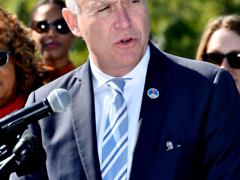 D.C. Attorney General Brian Schwalb announces during an Oct. 3 press conference that Pepco would pay the city $57 million in a settlement over contaminants the company dumped into the Anacostia River. (Robert R. Roberts/The Washington Informer)