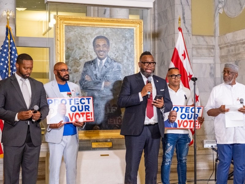 The Rev. Thomas Bowen, senior adviser in the White House Office of Public Engagement, offered a call to action and led a prayer during the John Lewis National Day of Action at the John A. Wilson Building in D.C. (Ja'Mon Jackson/The Washington Informer)