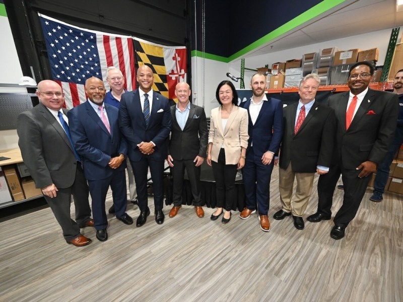 U.S. Rep Glenn Ivey, Maryland Gov. Wes Moore (front row second and third from left), Advance Research Projects Agency-Energy Director Dr. Evelyn Wang (front row center) and University of Maryland President Darryll Pines (front row far right) attended Beltsville’s ION Storage Systems to celebrate the battery plant’s success and growth. (Courtesy of the Office of Gov. Wes Moore)