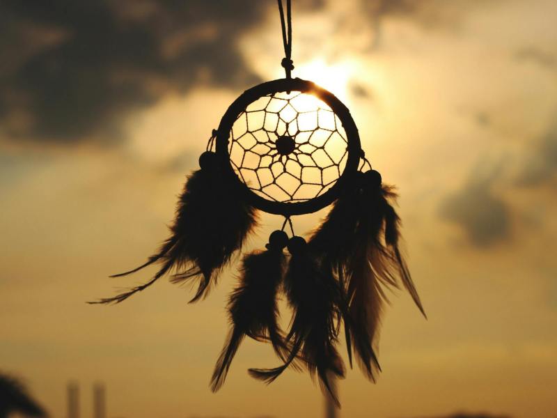 silhouette of hanging dreamcatcher